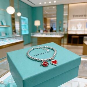 Tiffany & Co. Silver Bracelet with Red Accents
